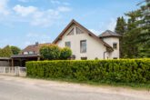 Norderstedt - Harksheide | Charmante Villa in familienfreundlicher Lage mit herrlich angelegtem Garten - Ansicht von der Straße