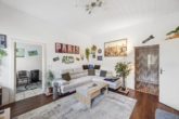 Wohnzimmer WE3 - Kapitalanlage – Vollvermietetes MFH mit vier Wohneinheiten
