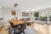 Wohn- und Essbereich - Hamburg-Wellingsbüttel | Zentrumsnahe 2,5-Zimmer-Erdgeschosswohnung mit einer großzügigen Terrasse