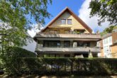 Gartenansicht - Hamburg-Wellingsbüttel | Zentrumsnahe 2,5-Zimmer-Erdgeschosswohnung mit einer großzügigen Terrasse