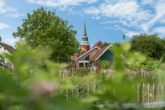 Mittelnkirchen | Exkl. Hofensemble mit charmantem Reetdachhaus und Hofcafé auf besonderem Grundstück - Wundervolle Sichtachsen