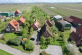 Mittelnkirchen | Exkl. Hofensemble mit charmantem Reetdachhaus und Hofcafé auf besonderem Grundstück - Überblick aus der Luft