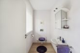 Wrestedt - Wieren | Modernes Einfamilienhaus mit zahlreichen Raffinessen & hochwertiger Ausstattung - Gäste-WC im Erdgeschoss