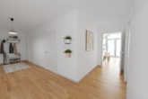 Visualisierung: großzügiger Flur - Neubau in Henstedt-Ulzburg | Schlüsselfertige Dachgeschosswohnung mit schöner Gartenansicht