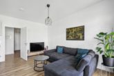 Wohnbereich - Hamburg – Schnelsen | Moderne 4-Zimmer-Eigentumswohnung im Neubau in zentraler Lage mit Balkon