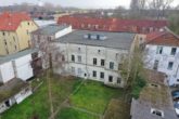 Hausrückseite - Brunsbüttel | Gut vermietetes Mehrfamilienhaus mit 9 Einheiten in zentraler Lage von Brunsbüttel