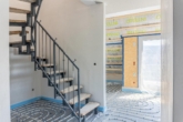 Treppe zur oberen Ebene