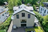 Hamburg - Sülldorf | Familienfreundliche und bezugsfertige Erdgeschosswohnung auf zwei Ebenen mit Garten - Rückansicht